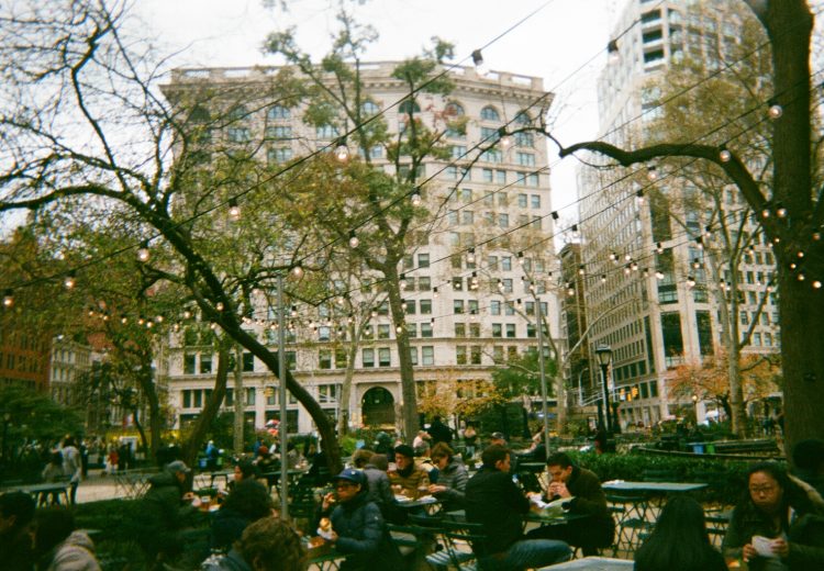 people eating outside shake shack new york city